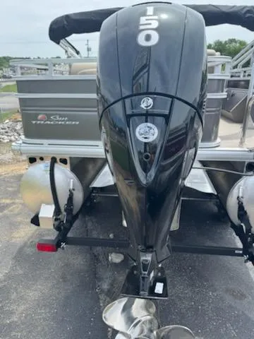 Slide: The Image of 2025 Sun Tracker Fishin' Barge 22 DLX with powerful 150 HP outboard motor. - 3