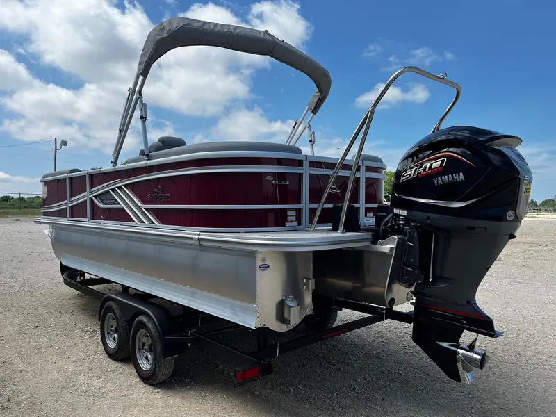 Slide: The Image of 2025 SunCatcher Fusion 322RC pontoon boat with Yamaha engine on trailer. - 5