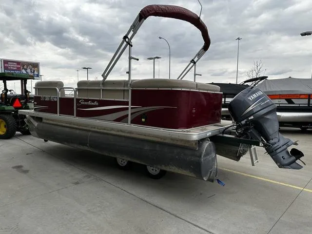 Slide: The Image of 2012 Godfrey Sweetwater pontoon boat with Yamaha outboard motor on a cloudy day. - 21