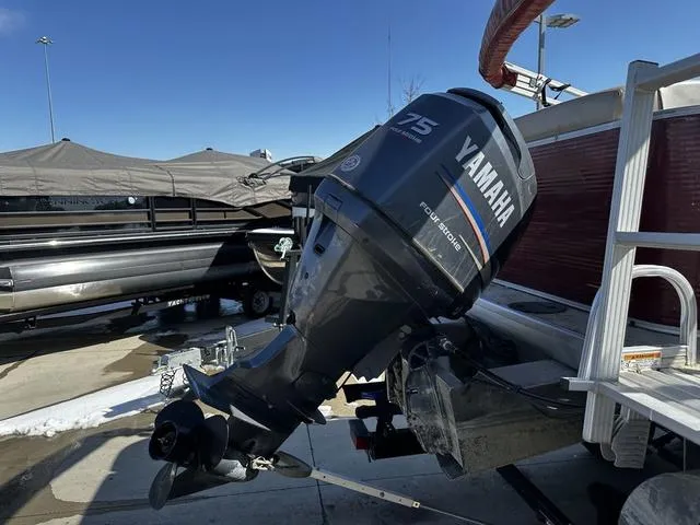 Slide: The Image of 2012 Godfrey Sweetwater boat with Yamaha 75 horsepower outboard motor. - 7