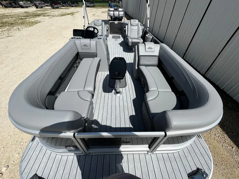 Slide: The Image of 2025 SunCatcher Fusion 324RC pontoon boat with spacious seating and modern design. - 8