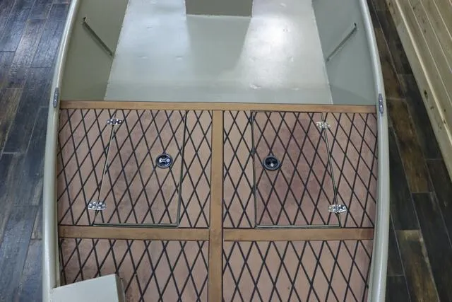 Slide: The Image of 2023 XTREME BOATS Brute 1754 CC interior with diamond-patterned flooring. - 10