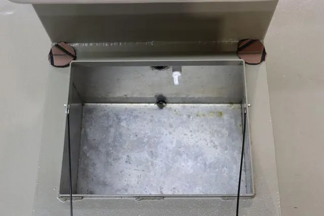 Slide: The Image of 2023 XTREME BOATS Brute 1754 CC storage compartment, open lid, interior view. - 18