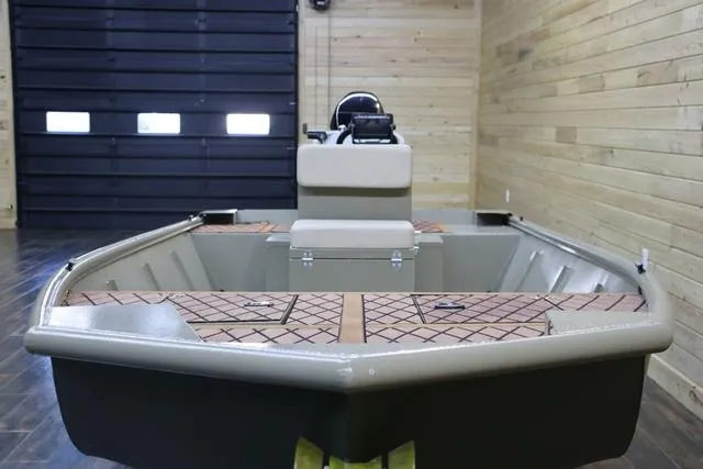 Slide: The Image of 2023 XTREME BOATS Brute 1754 CC in a wooden interior setting. - 4