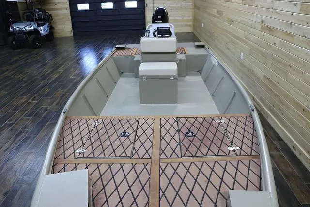 Slide: The Image of 2023 XTREME BOATS Brute 1754 CC in a wooden interior showroom. - 9