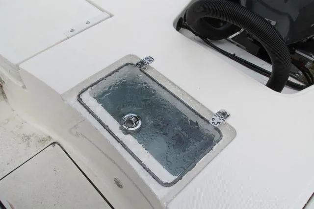 Slide: The Image of 2023 Sea Born FX22 boat deck with a closed livewell. - 14