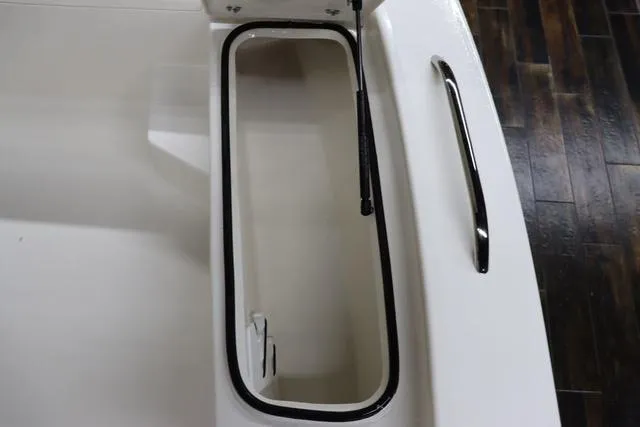 Slide: The Image of 2023 May-Craft 2200 Bay boat storage compartment with handle and hydraulic support. - 18
