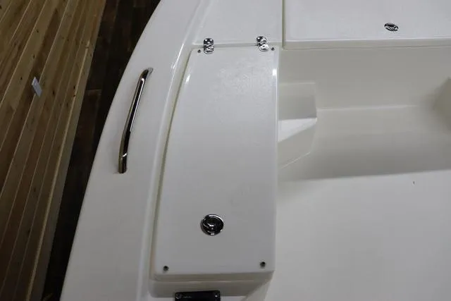 Slide: The Image of 2023 May-Craft 2200 Bay boat deck with storage compartment and handle. - 20