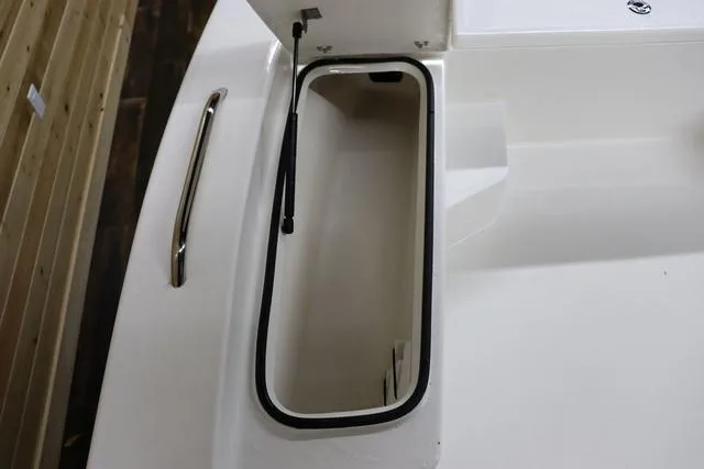 Slide: The Image of Open storage compartment on 2023 May-Craft 2200 Bay boat. - 21