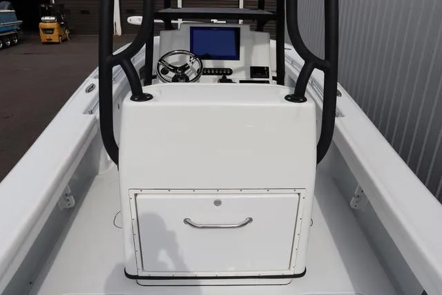 Slide: The Image of 2025 Yellowfin 26 Hybrid boat console with steering wheel and digital display. - 12