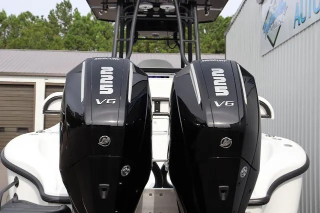 Slide: The Image of Twin Mercury 225 V6 engines on a 2025 Yellowfin 26 Hybrid boat. - 29
