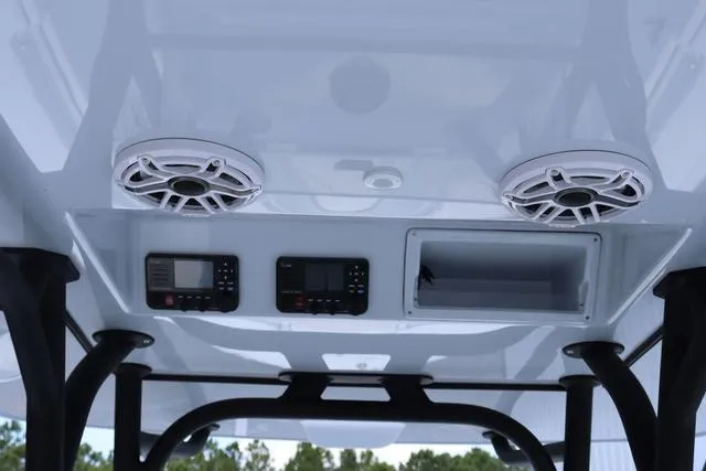 Slide: The Image of 2025 Yellowfin 32 boat console with speakers and electronic displays. - 15