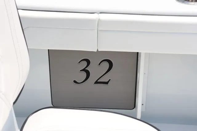 Slide: The Image of 2025 Yellowfin 32 boat interior with number 32 displayed prominently. - 19