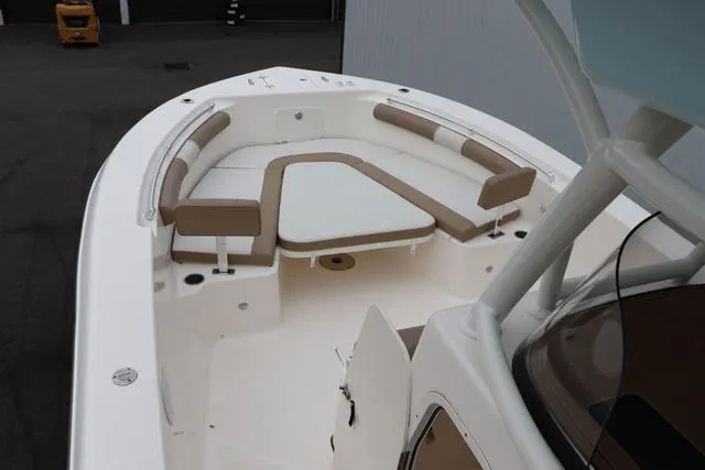 Slide: The Image of 2023 Sea Born LX26 boat with spacious seating and modern design. - 25