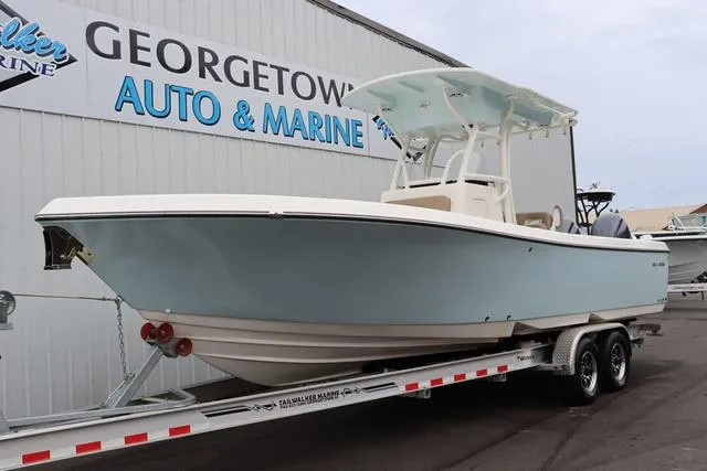 Slide: The Image of 2023 Sea Born LX26 boat on trailer at Georgetown Auto & Marine dealership. - 3