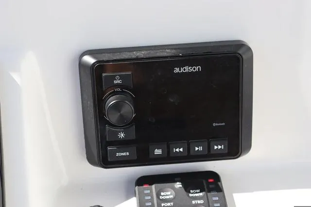 Slide: The Image of Audison audio control panel on 2023 Sea Pro 219 Deep V Series boat. - 12