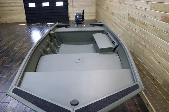 Slide: The Image of 2025 War Eagle 548LDV boat in a wooden interior setting. - 3