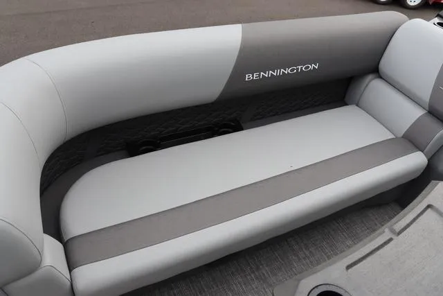 Slide: The Image of 2024 Bennington 22 SSR-SPS boat interior with gray seating and logo. - 14
