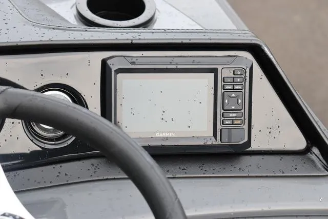 Slide: The Image of Dashboard of 2024 Bennington 22 SSR-SPS with Garmin display, wet from rain. - 22