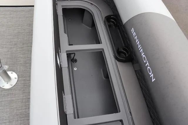 Slide: The Image of 2024 Bennington 22 SSR-SPS boat storage compartment with sleek design and durable materials. - 27