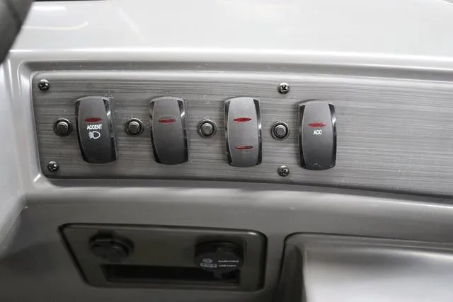 Slide: The Image of Control panel of 2024 Bennington 22 SVL boat with labeled switches. - 19
