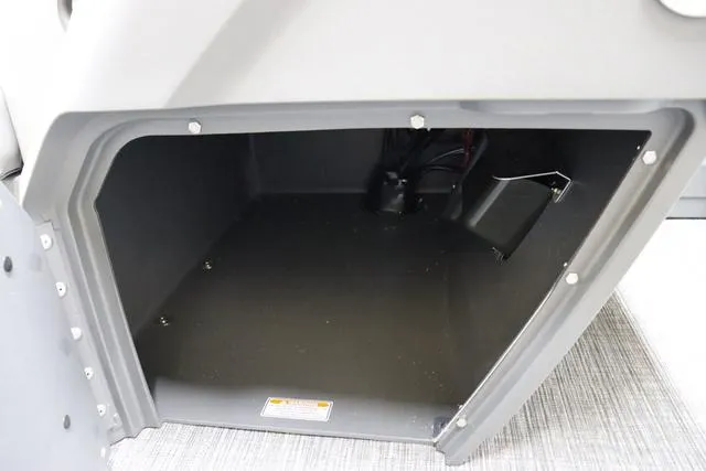 Slide: The Image of 2024 Bennington 22 SVL storage compartment, spacious and secure, with durable construction. - 24