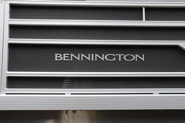 Slide: The Image of 2024 Bennington 22 SVL boat logo on sleek metallic surface. - 5