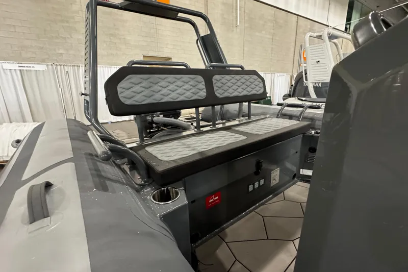 Slide: The Image of 2026 Highfield Sport 660 boat interior with seating and storage compartment. - 7