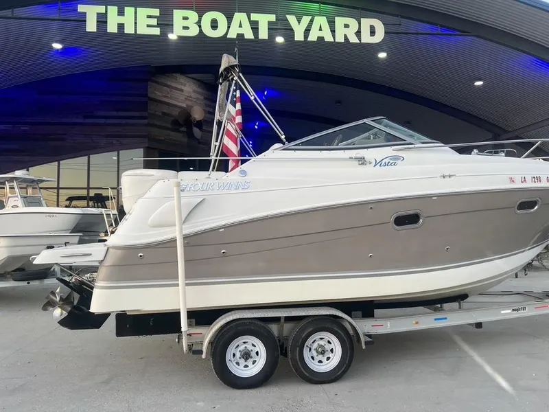 Slide: The Image of 2004 Four Winns 248 Vista boat on trailer at The Boat Yard. - 2