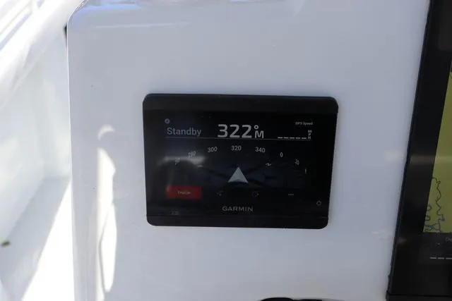 Slide: The Image of Garmin navigation display on 2025 Yellowfin 26 Hybrid boat dashboard. - 17