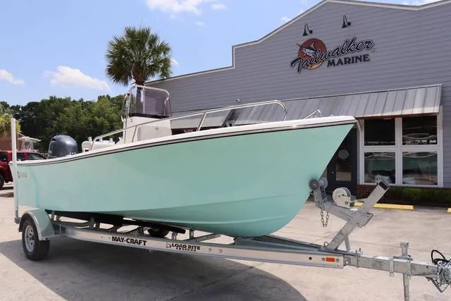 Slide: The Image of 2023 May-Craft 1900 CC boat on trailer outside Tailwalker Marine. - 3