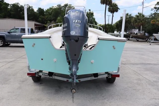 Slide: The Image of 2023 May-Craft 1900 CC boat with Yamaha 115 engine on trailer, outdoor setting. - 4