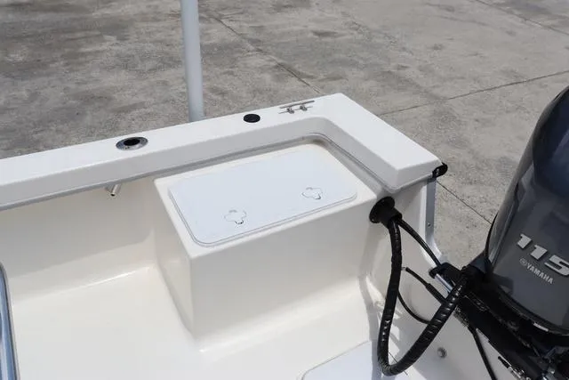 Slide: The Image of 2023 May-Craft 1900 CC boat with Yamaha 115 engine, featuring a clean deck layout. - 13