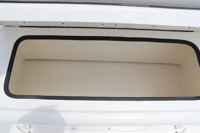 Slide: The Image of Storage compartment of 2023 May-Craft 1900 CC boat, open and empty. - 32