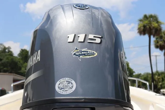 Slide: The Image of Yamaha 115 outboard motor on a 2023 May-Craft 1900 CC boat, featuring ultra-low emissions. - 9