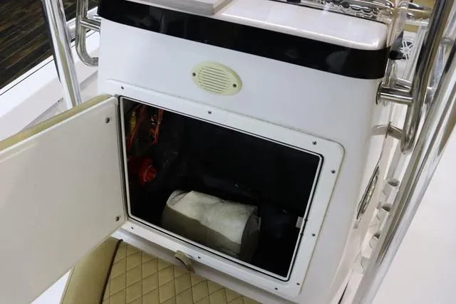 Slide: The Image of Open storage compartment on 2021 Sportsman Masters 207 Bay Boat, showcasing interior space. - 10