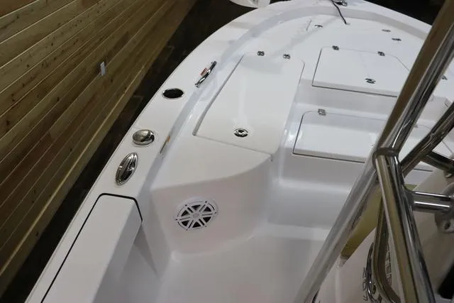 Slide: The Image of 2021 Sportsman Masters 207 Bay Boat interior with seating and storage compartments. - 20