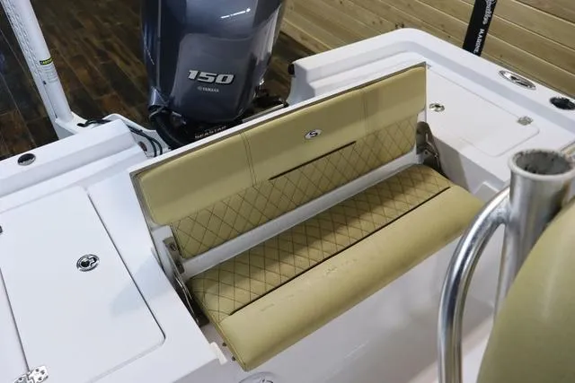 Slide: The Image of 2021 Sportsman Masters 207 Bay Boat with tan seating and Yamaha 150 engine. - 6