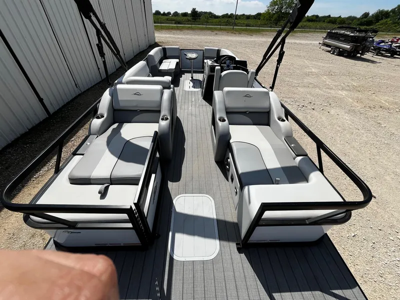 Slide: The Image of 2025 SunCatcher Select 324SS pontoon boat with spacious seating and modern design. - 11