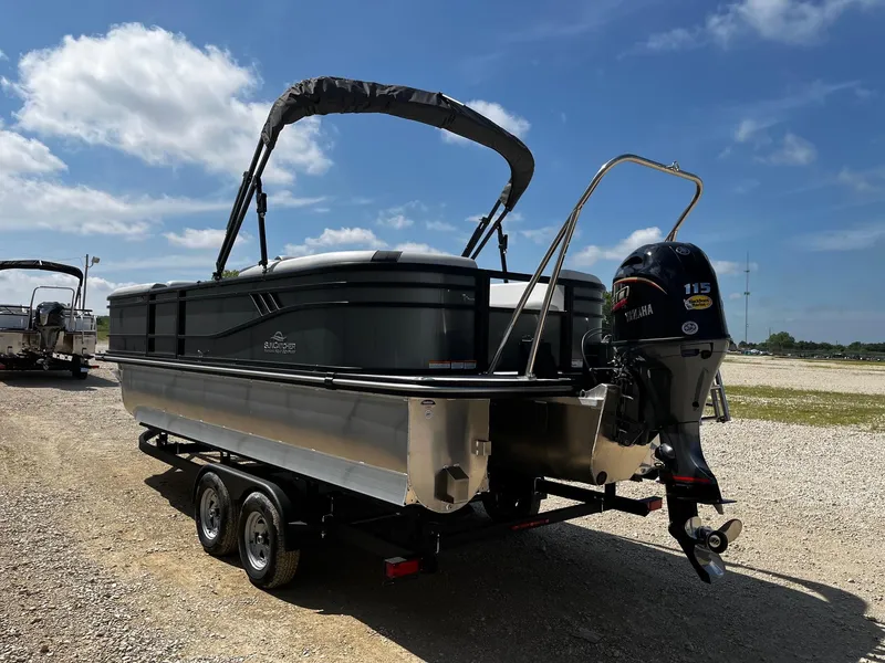 Slide: The Image of 2025 SunCatcher Select 322RC pontoon boat on trailer, featuring Yamaha 115 outboard motor. - 5