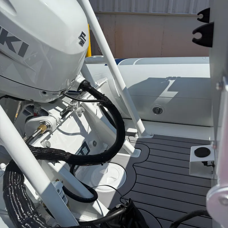 Slide: The Image of 2025 Highfield CL400 boat interior with Suzuki engine, featuring modern design and equipment. - 8