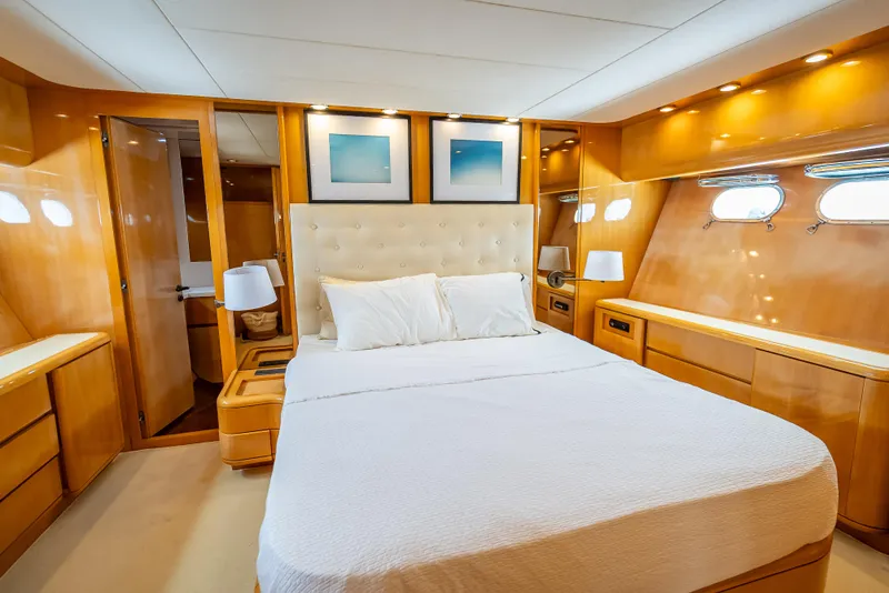 Slide: The Image of Luxurious cabin interior of 1995 Sanlorenzo 62 yacht with elegant wood finish. - 19