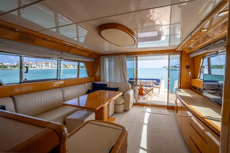 Slide: The Image of Luxurious interior of 1995 Sanlorenzo 62 yacht with ocean view and elegant furnishings. - 40