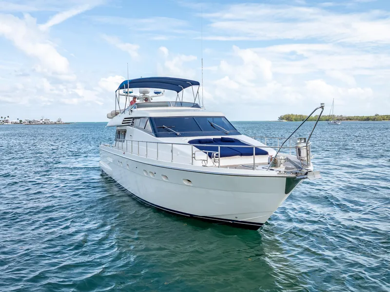 Slide: The Image of Sanlorenzo 62 yacht from 1995 cruising on a sunny day in open waters. - 6