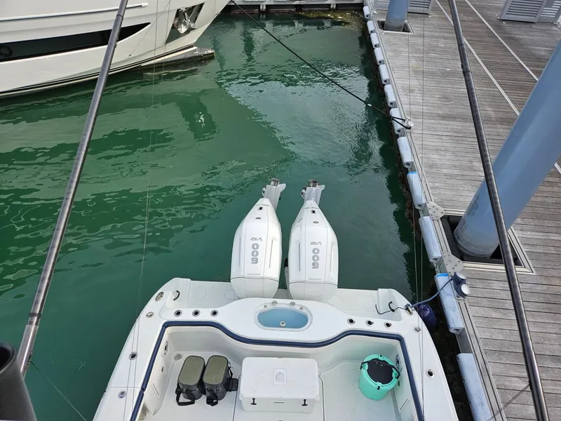 Slide: The Image of 2022 Yellowfin 39 Offshore boat docked with twin engines, viewed from above. - 10