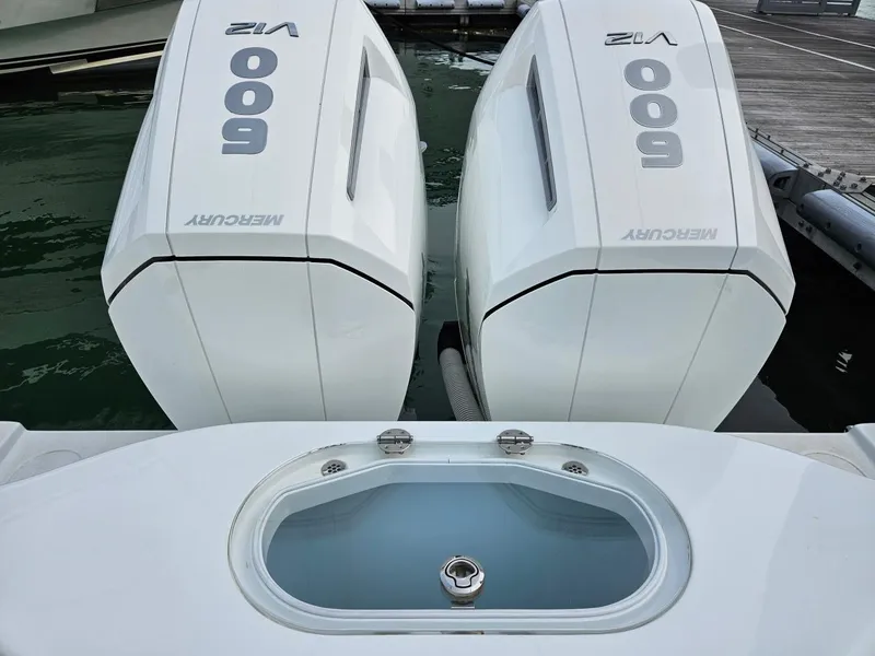 Slide: The Image of Twin Mercury 600 V12 engines on a 2022 Yellowfin 39 Offshore boat at the dock. - 15