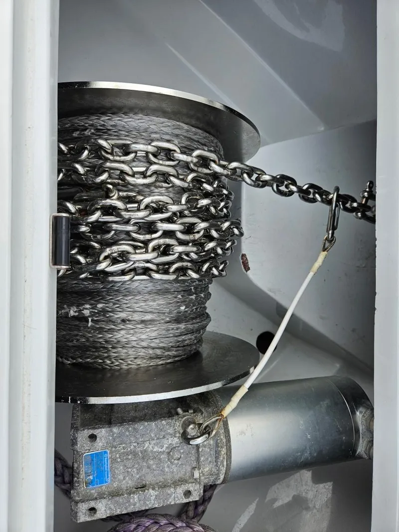 Slide: The Image of Anchor chain and winch system on 2022 Yellowfin 39 Offshore boat. - 19