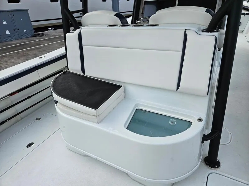 Slide: The Image of 2022 Yellowfin 39 Offshore boat seating with storage and livewell. - 9