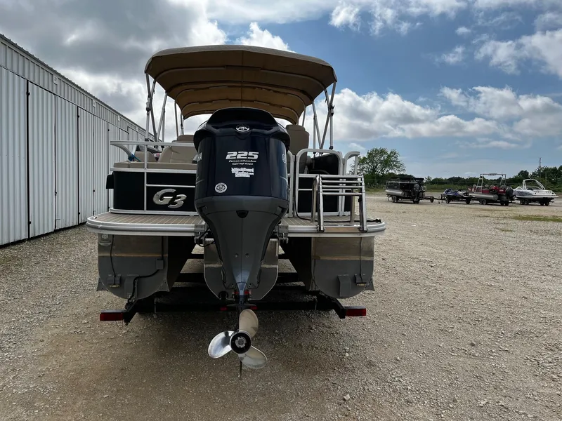Slide: The Image of 2016 SunCatcher Elite 324 RS pontoon boat with Yamaha 225 engine, parked outdoors. - 6