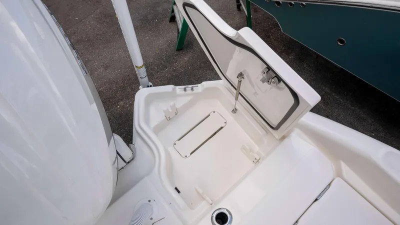 Slide: The Image of Open storage compartment on 2025 Solace 28 HCS boat. - 29